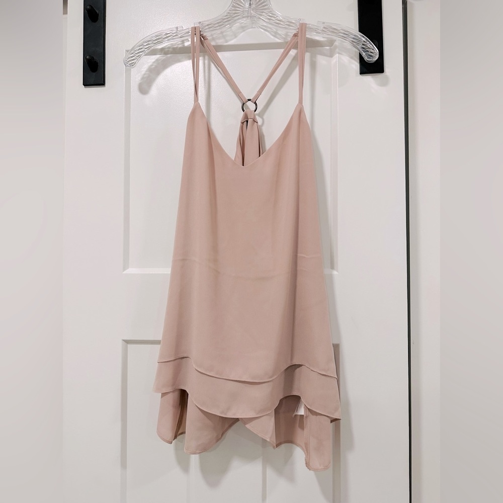 Pink Maurices tank top.